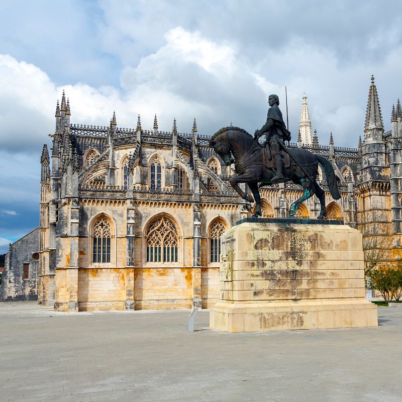 Leave Lisbon behind and head north to the small hill town of Batalha, best known for its ornate gothic monastery built to commemorate Portugal's victory in the infamous battle of Aljubarrota. Visit the historic Monastery of Batalha with free time to wander the grounds. Continue to the medieval capital of Portugal, Coimbra.