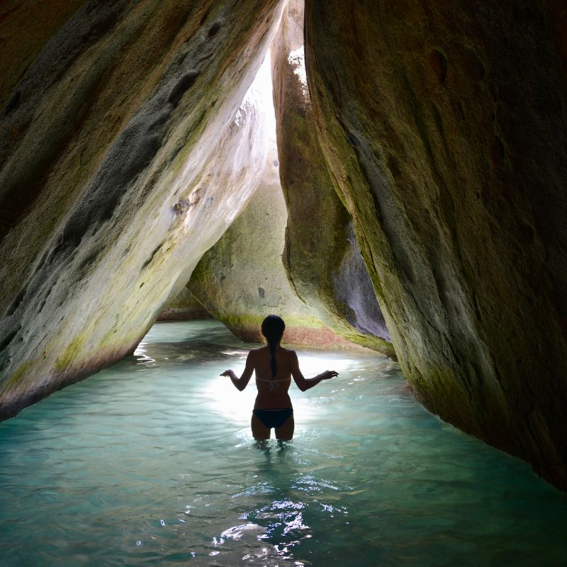 Day 5 of Treasure Islands cruise with Red Orchid Women’s Travel - Take a bath at the "Baths", Virgin Gorda's unique water grottos formed eons ago by ancient lava flows. Huge boulders lie scattered around the natural pools, which are delightful for swimming or soaking.