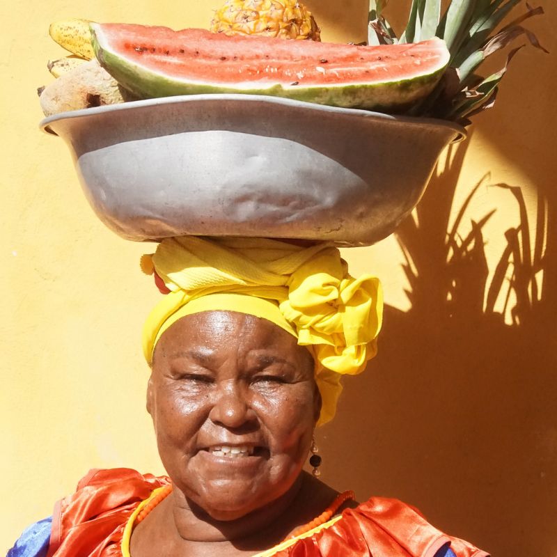 In Palenque, you will se many colourfully dressed women carrying food on their heads.