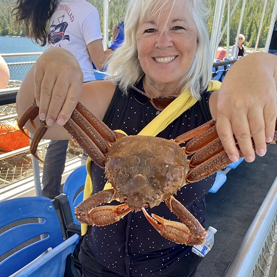 Renne Blokzyl holding up a king crab