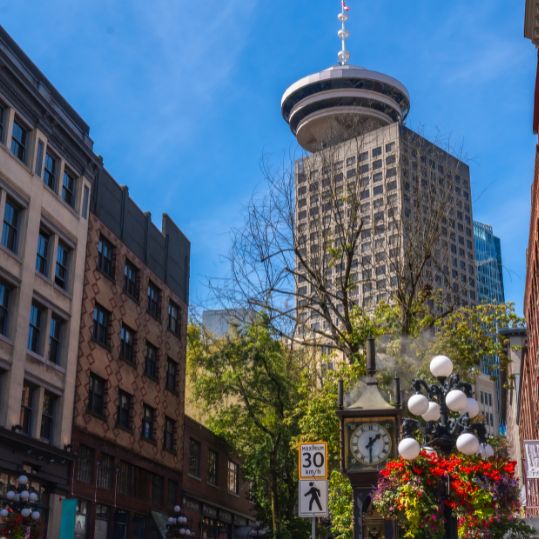 The historic charm of Gastown, with its cobblestone streets and historic cafes in the bustling waterfront of the Port of Vancouver.