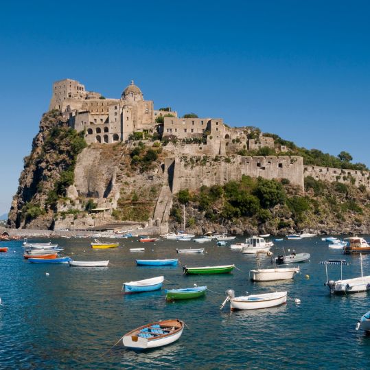 Sail to the enchanting Isle of Ischia aboard a high-speed ferry. Explore this small island, with its lush gardens and picturesque castles, accompanied by a local guide. Return to Naples in the late afternoon for an evening at leisure.