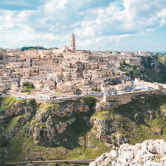 Today, it’s your choice! You can hike into Matera’s 9000-year-old history on a guided hike along its hillside caves, narrow passages, and steep alleys known to locals as the Sassi