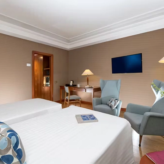 Timeless design and beauty on the Naples seafront. Spacious and bright, all the rooms feature contemporary furnishings with refined, minimalist finishes. The panoramic rooms offer balconies with sweeping views over the Gulf of Naples, from Mount Vesuvius to the Posillipo hill.